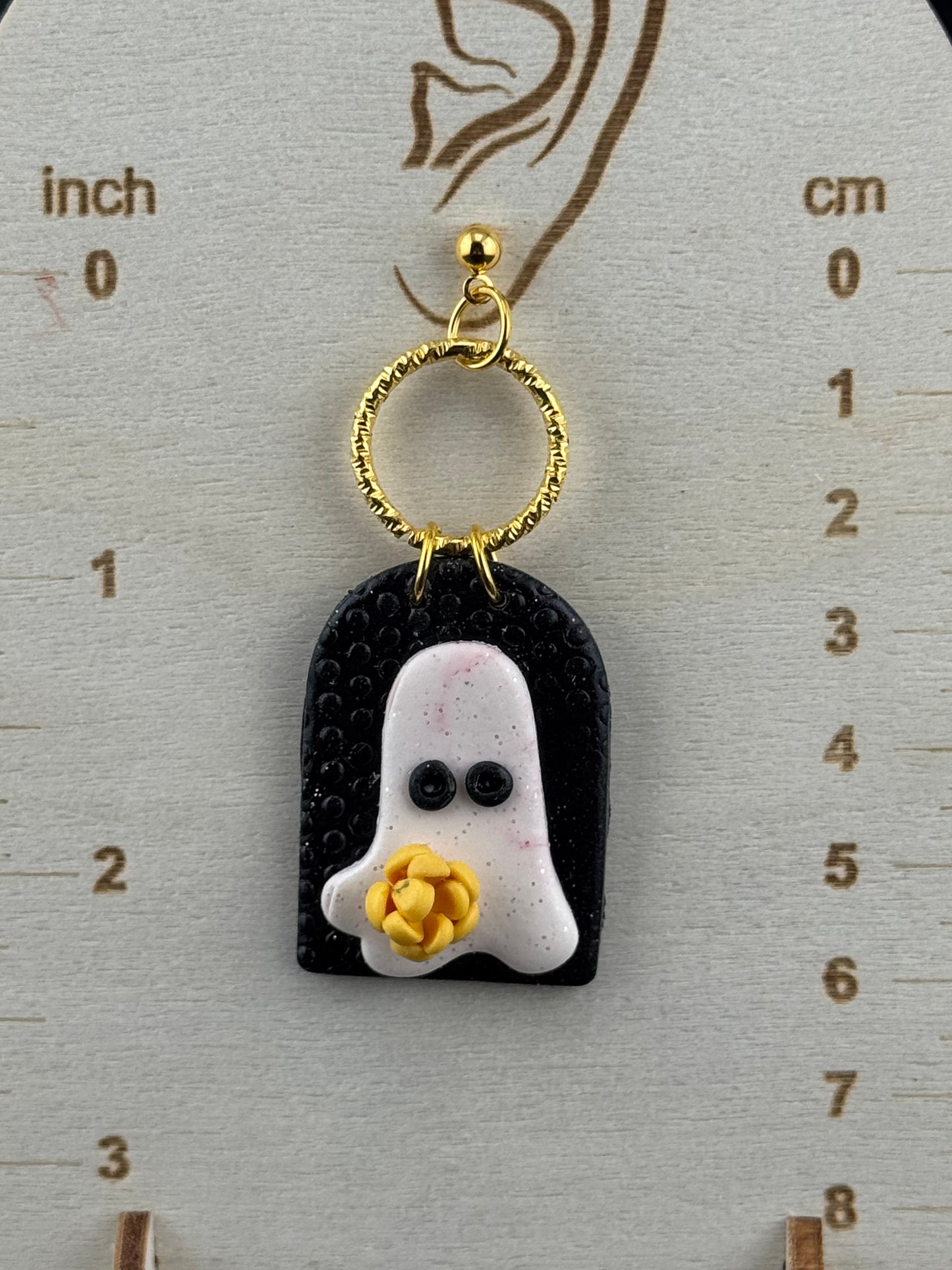 Ghost Holding a Yellow Flower on Black Arch with Gold charm and Gold Ball post Earrings