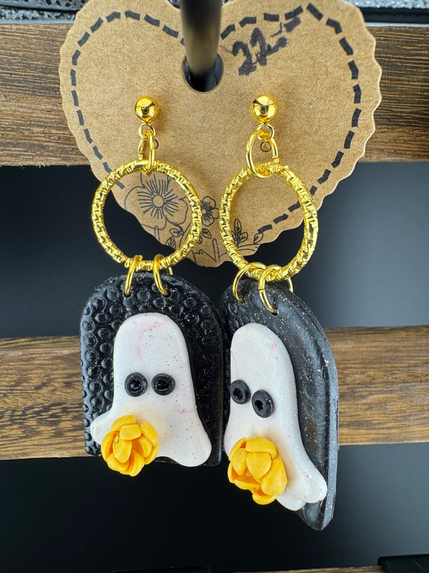 Ghost Holding a Yellow Flower on Black Arch with Gold charm and Gold Ball post Earrings